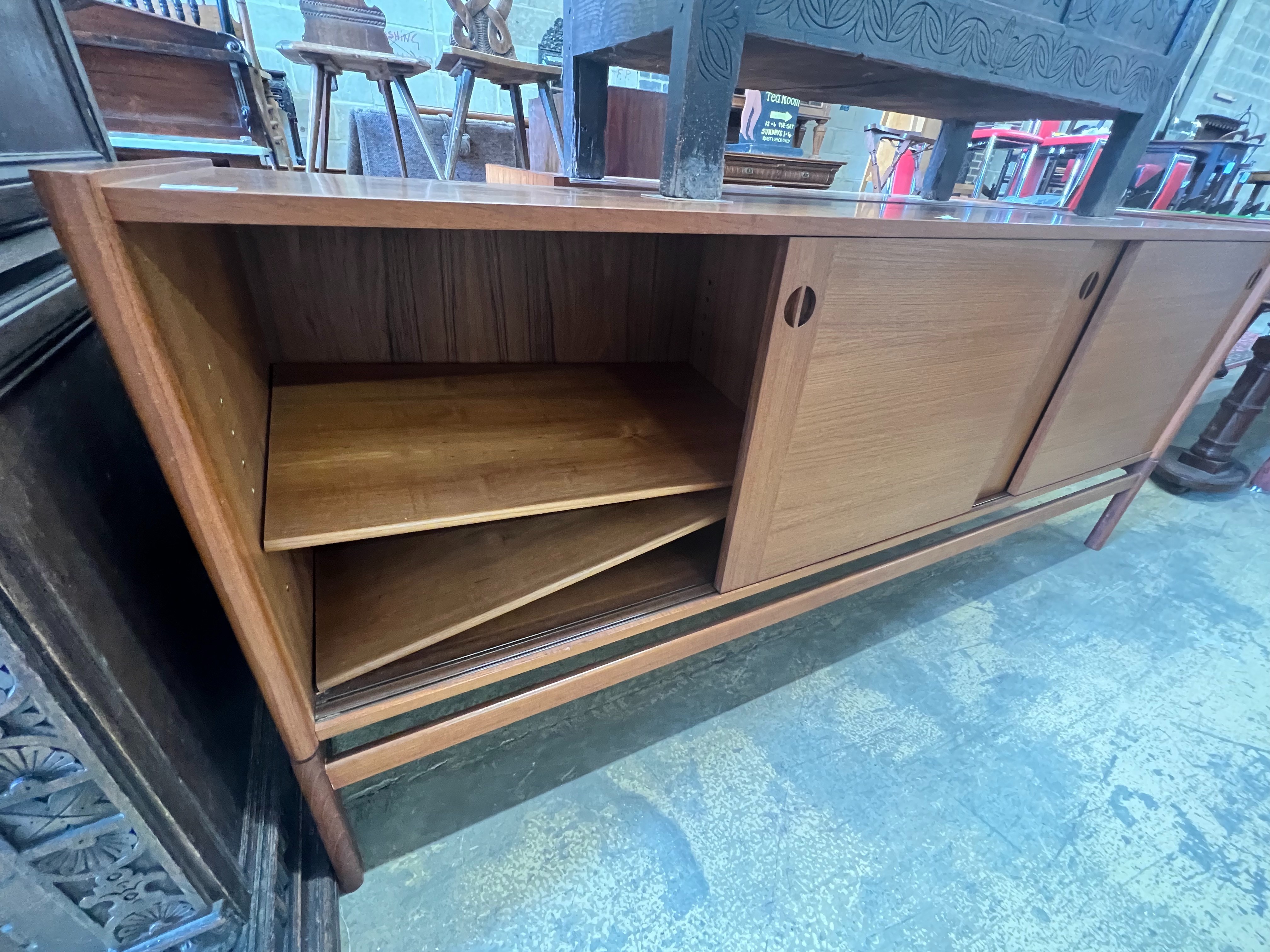 A 1950's Danish teak tambour sideboard, width 200cm depth 46cm height 86cm